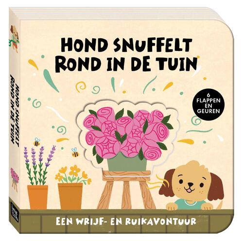 Hond snuffelt rond in de tuin